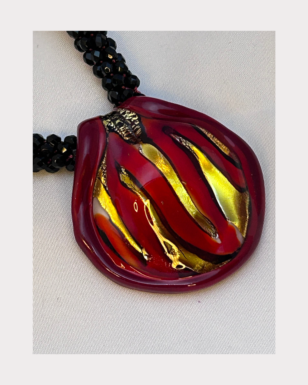 Black and Red Tiger Claw Murano on Kumihimo braid