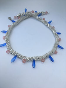 Rose beads with Blue daggers